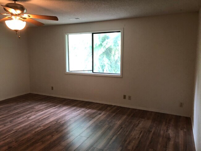 master bedroom window looking out to backyard - 10405 SE 13th Cir