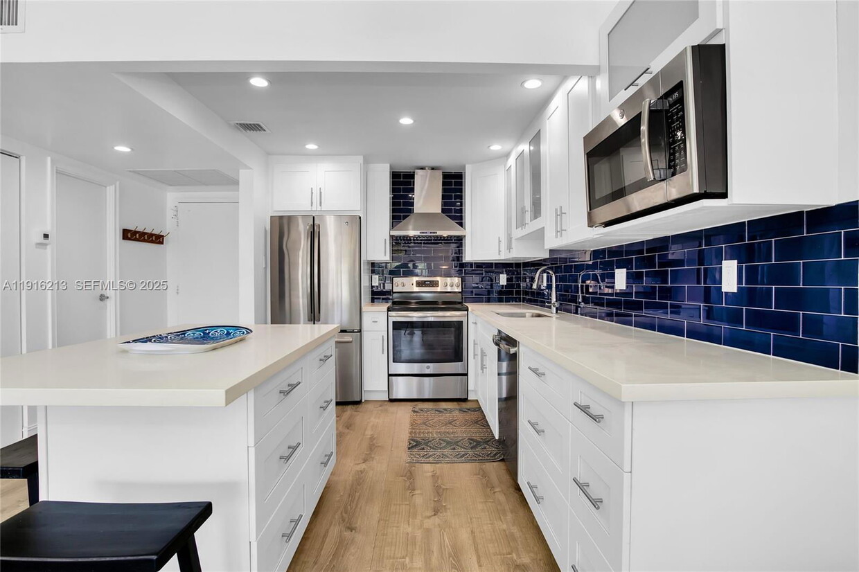 Photo - 100 Edgewater Drive Apt #2, Miami, FL 33133 - 1 BR 1.5 BA condo