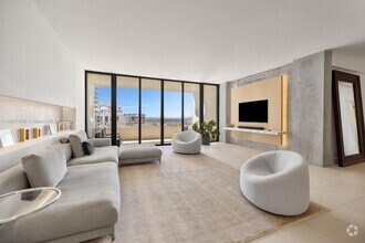 Building Photo - 10205 Collins Ave