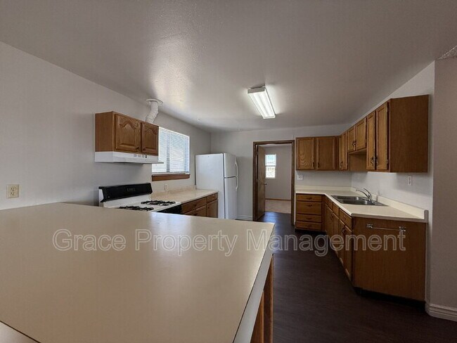 Foto del edificio - 1149 E 58th Ave