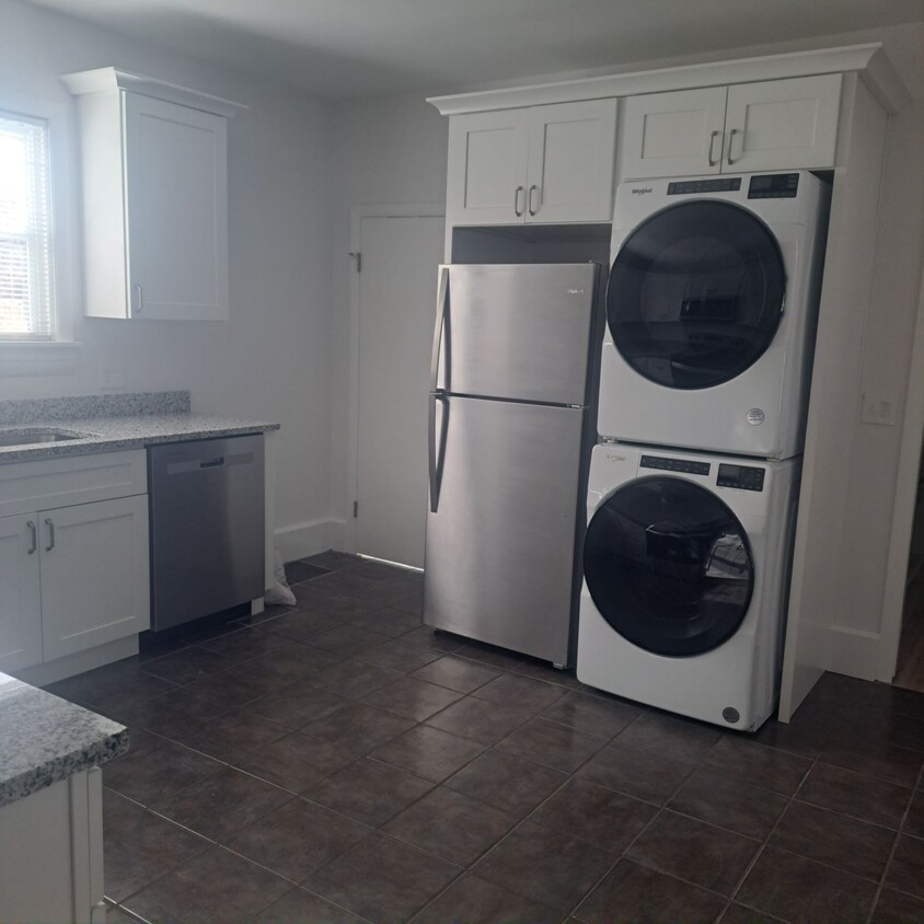 Freshly renovated kitchen, all appliances and cabinets, including in unit, washer and dryer - 12 Tiffany St