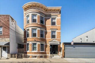 Building Photo - 36-34-36-11 11th St