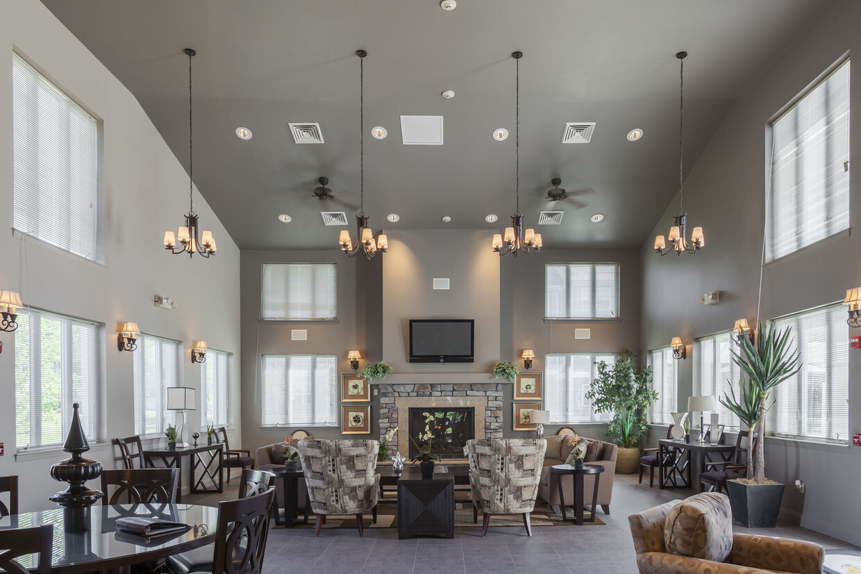 Modern Resident Clubhouse with Lounge Seating and Fireplace - Quail Run