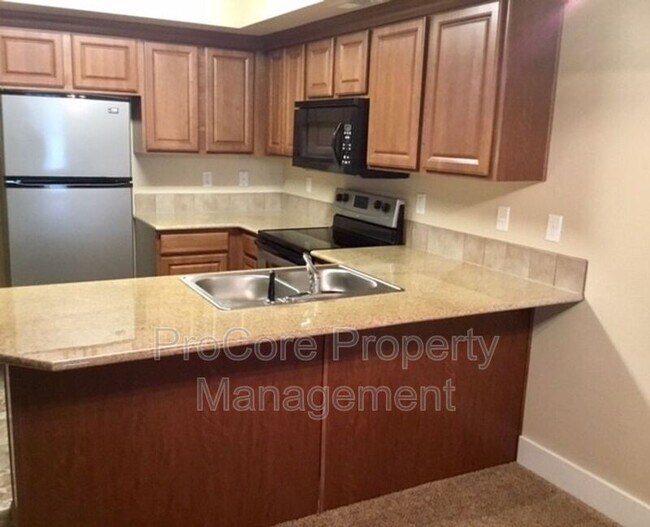 Building Photo - 9818 W Rosecroft Ct