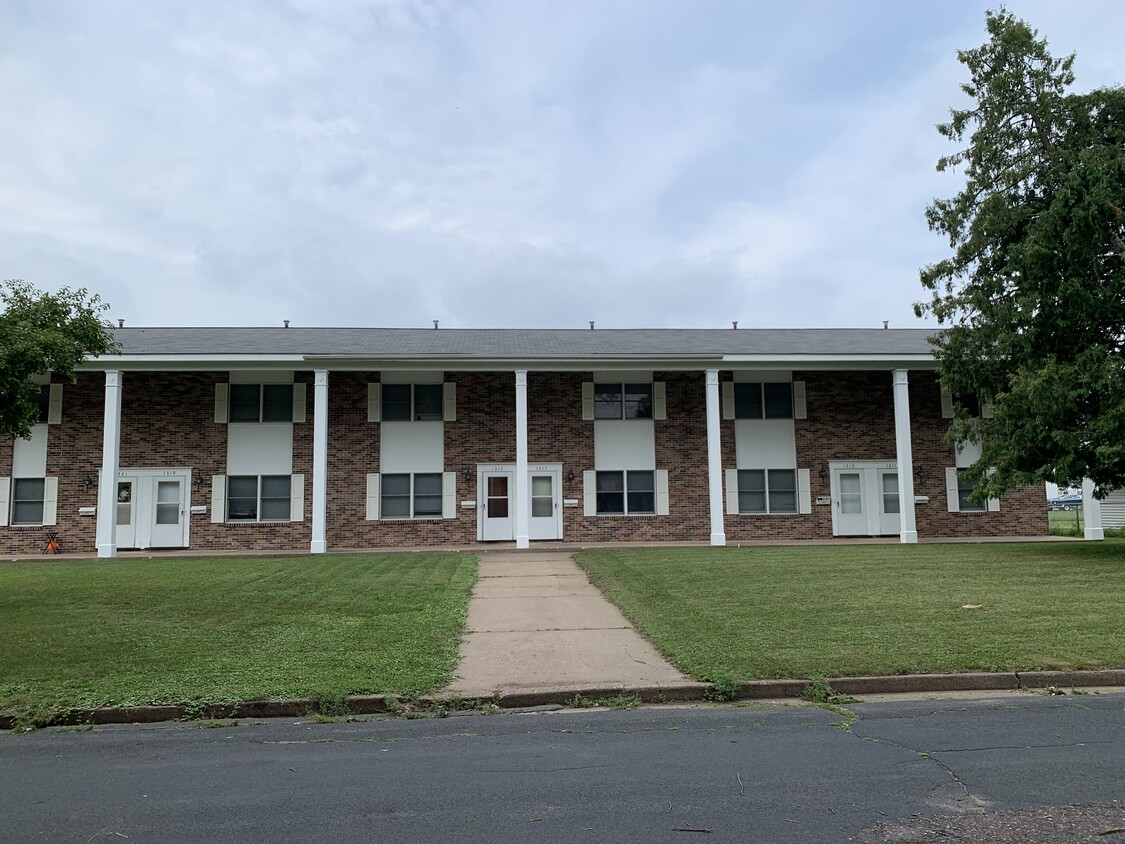 Brick exterior - freshly painted trim throughout - 1311 4th St W