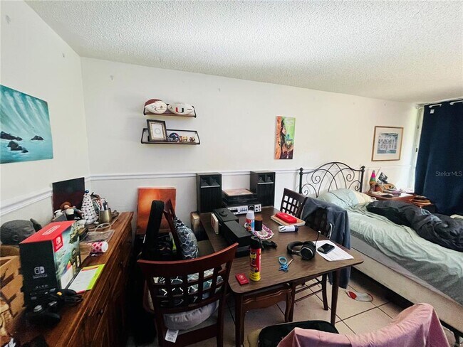 Foto del edificio - 7900 S Orange Blossom Trail