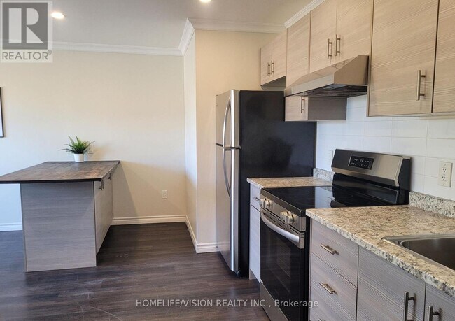 Photo du bâtiment - 130 King St E