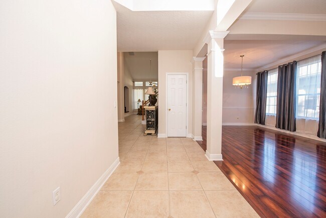 Building Photo - Spacious 4/3.5 with Stunning Lake Views in...