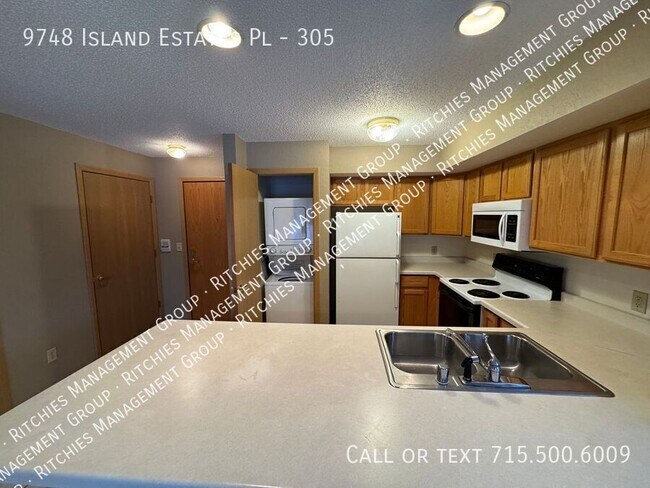 Foto del edificio - 9748 Island Estates Pl