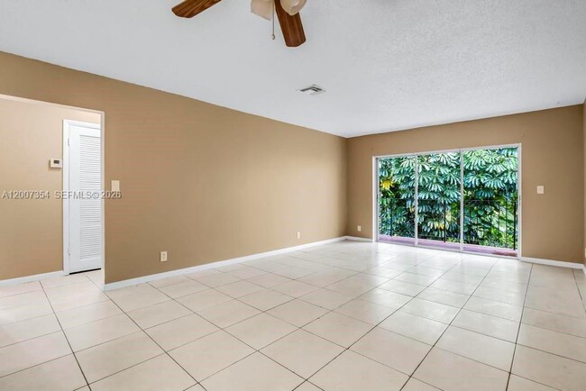Building Photo - 3100 Coral Springs Dr