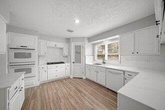 Building Photo - 8611 Spruce Mill Dr