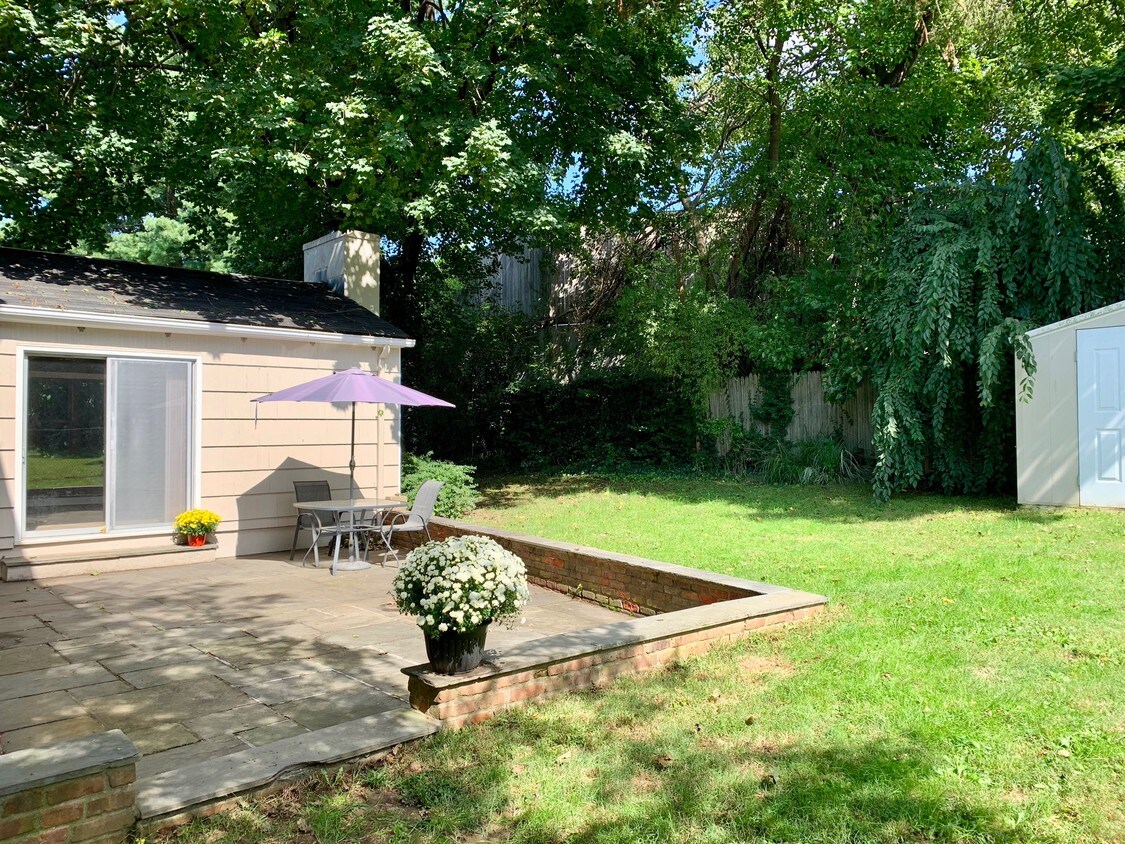 Fully fenced in private backyard and patio. - 4 Westview Ave
