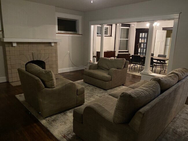 large dinning room, living room, comes with rug and couches, table and chairs. - 339-2 Probasco St