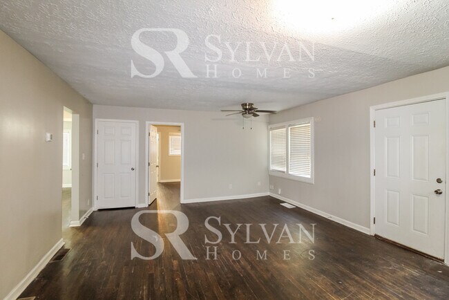 Building Photo - The living is easy in this 3 bedroom, 2 bathroom home