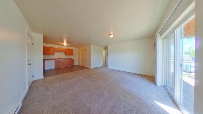 Building Photo - Centrally Located Second Floor 2b w/ Private Deck! Close to MSU & Downtown