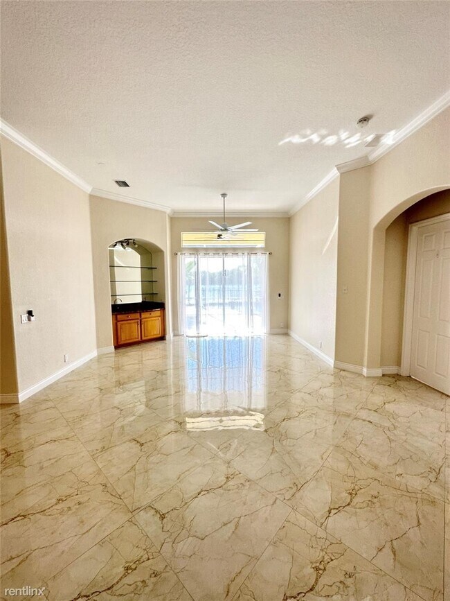 Foto del edificio - 5 br, 3 bath House - 4824 NW 124th Way