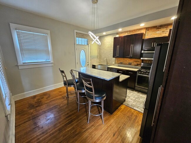 Canned lighting and fancy modern ceiling chandalier - 943 Highland St