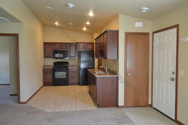 Foto del edificio - 2 Bedroom 1 Bath Heights Townhome