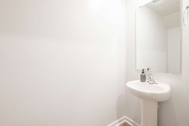 Building Photo - Partially furnished and now available!