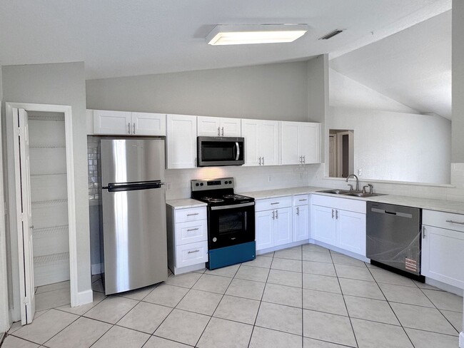 Building Photo - Freshly Renovated Three Bedroom Home Ready...