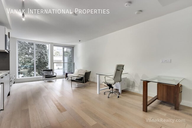 Building Photo - Modern Coal Harbour Studio with Luxury Amenities