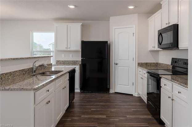 Building Photo - Spacious 3-Bedroom + Loft Home in Meredith Woods – Stylish, Efficient, and Perfect for Entertaining!