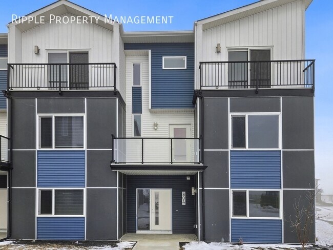 Building Photo - BRAND NEW 4 BEDS + DEN, 3.5 BATHS TOWNHOUSE | DOUBLE ATTACHED GARAGE