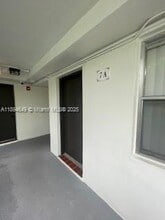 Building Photo - 465 S Royal Poinciana Blvd