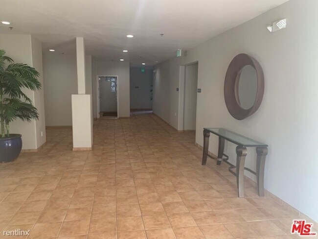 Building Photo - 2 br, 2 bath Condo - 10790 Rose Ave Unit 107