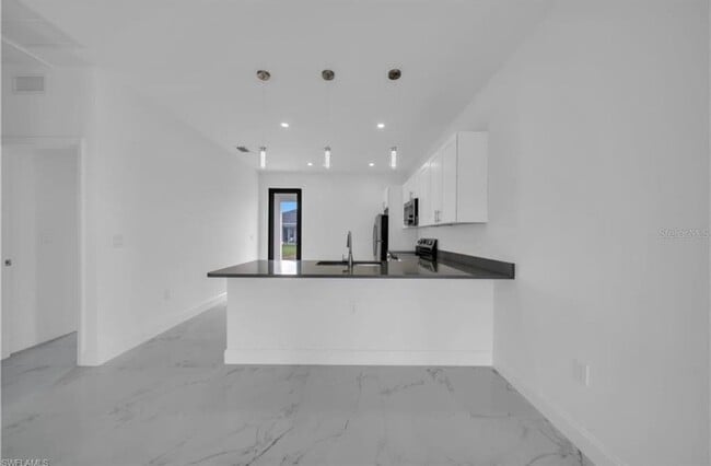 Foto del edificio - 4646 Leonard Blvd S