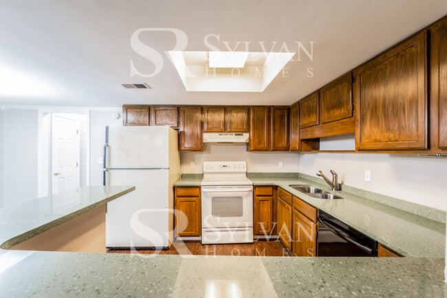 Building Photo - Discover Comfort and Convenience