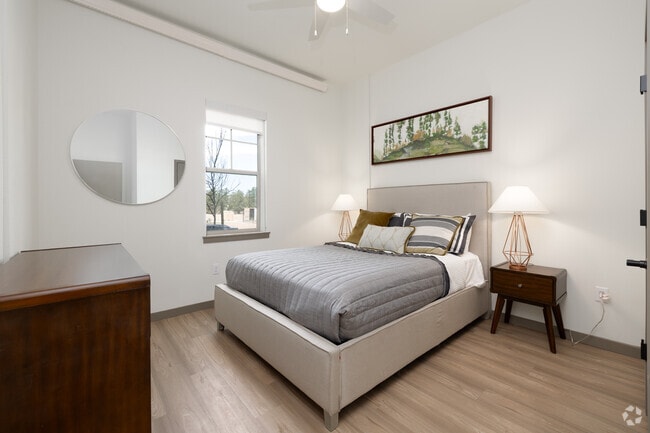 2BR, 1BA - 733SF - Primary Bedroom - The Meadowmark 55+ Active Adult Affordable Living