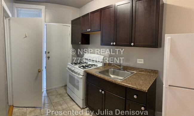 Foto del edificio - 5662 N Ridge Ave