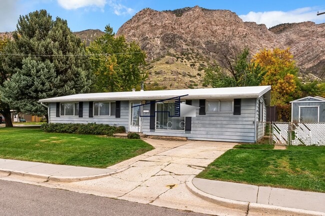 Building Photo - Ogden 4 Bedroom Home with Fenced Backyard!