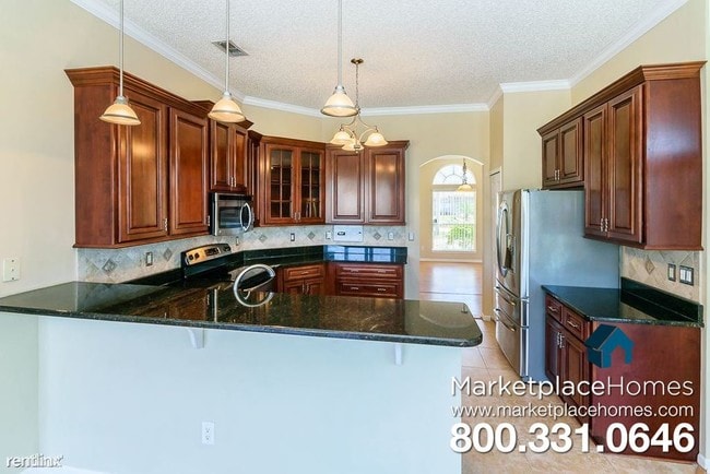 Building Photo - 5 br, 4 bath House - 922 Heritage Lakes Dr