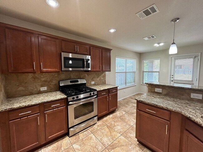 Building Photo - Sunlit Sanctuary: Spacious 4-Bedroom Home ...