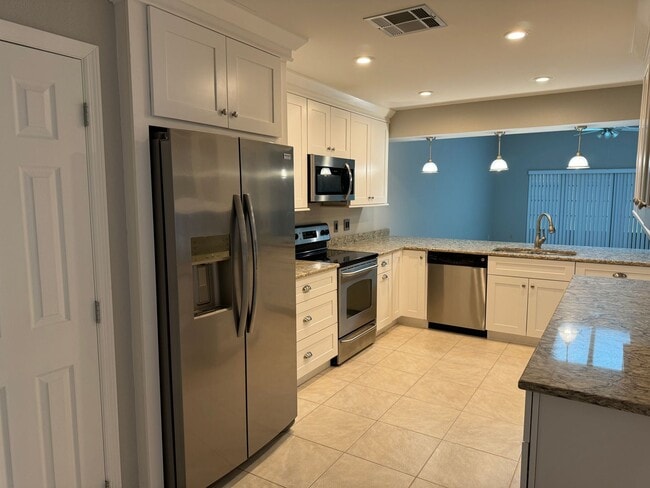 Building Photo - COMING SOON!! Highly Desirable DR PHILLIPS 3 bedroom 2 bath townhome with double car garage