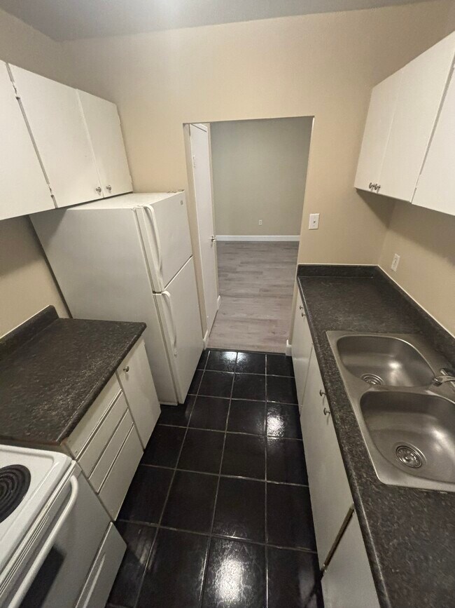 Photo du bâtiment - 225-225 Old Carriage Dr