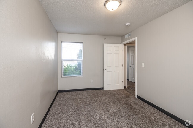 4BR, 2BA - 1,150SF - First Bedroom - Miller Avenue Estates