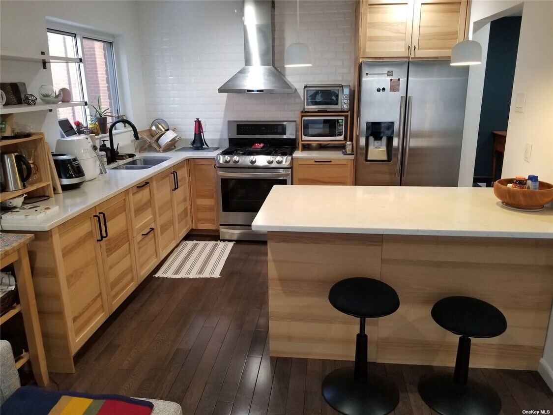Foto principal - 214-12-214-40 40th Ave