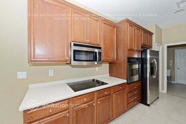 Building Photo - 27042 Firebush Dr