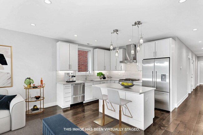 Foto del edificio - 6157 N Kenmore Ave