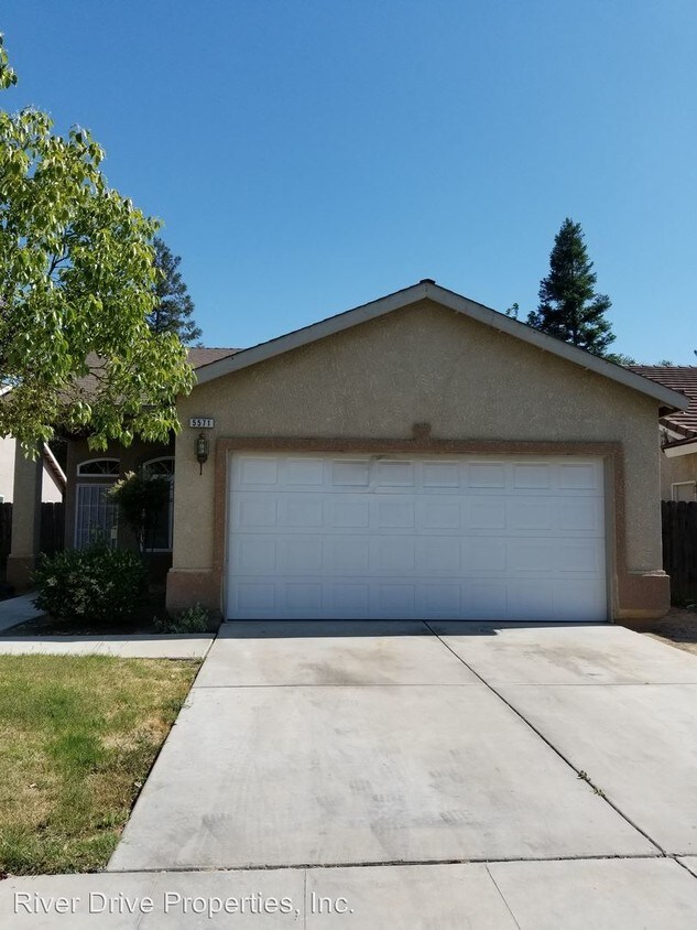 Primary Photo - 3 br, 2 bath House - 5571 W. Holland Ave.
