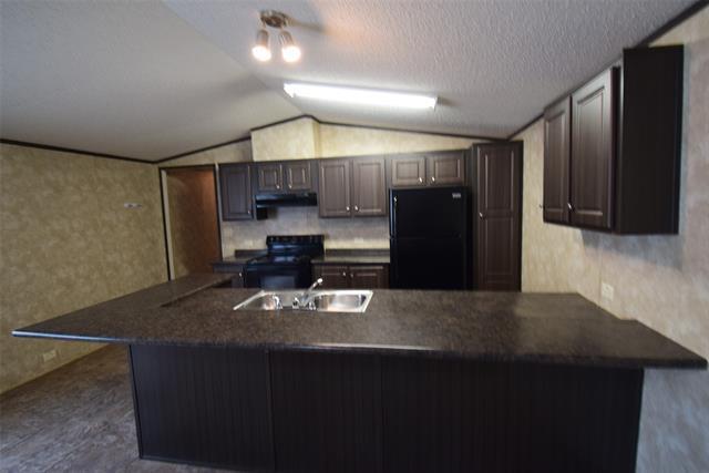 Foto del edificio - 6000 Spring Creek Pkwy