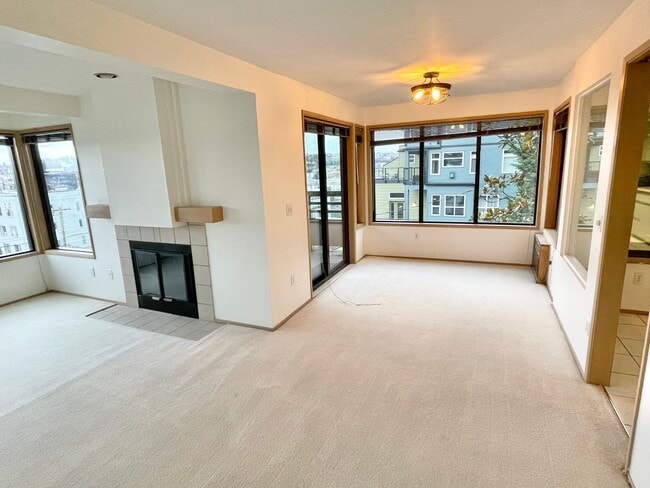 Building Photo - Queen Anne Condo with Exceptional Views and Two Parking Spots