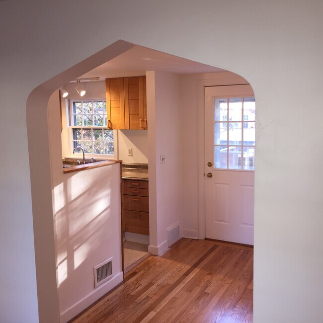kitchen opening onto dining room - 65 Fremont St