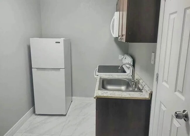 Building Photo - 1275 NW 58th Ave