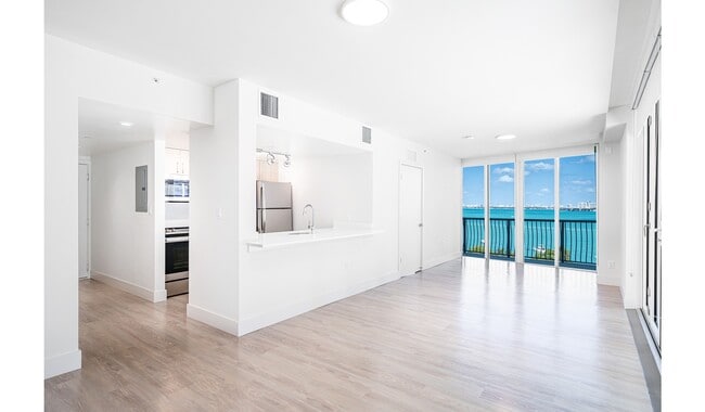 Spacious living room with ample natural light - Bay Parc