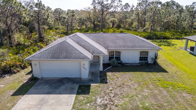 Building Photo - "Charming 3-Bed Oasis with 2 Baths - 1420 ...