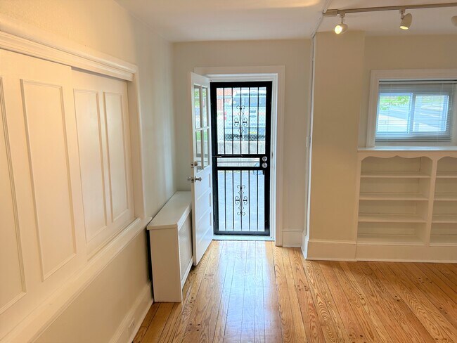 Living Room with Sliding Panels to Bedroom - 508 Central Ave